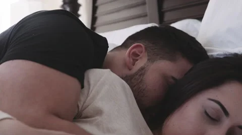 Closeup of beautiful couple waking up Stock Footage 58415467