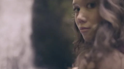 Closeup Of Beautiful Model's Face, Waterfall In Background (Slow Motion) Stock-Footage 56133606