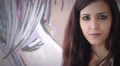 closeup of a beautiful woman laughing at the camera - graffiti HD Footage