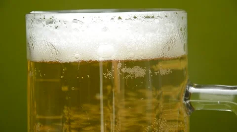 Closeup of beer foam, and bubbles Stock Footage 41030436