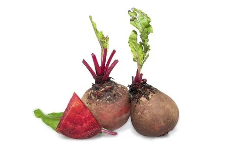 Closeup beetroot (beet root) and cut in half sliced isolated on white backg.. Stock Photos