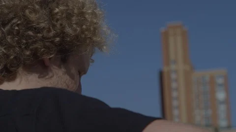 Closeup from behind cello player in New York City Stock Footage 111047049