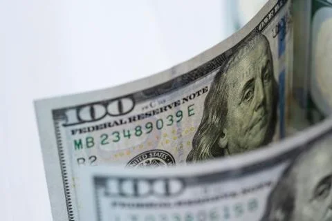 Closeup Benjamin Franklin face on one hundred US dollar banknote.-Image. Stock Photos