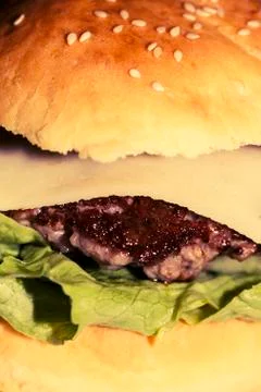 Closeup of big cheeseburger Stock Photos