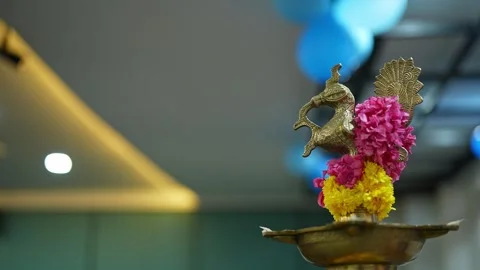 Closeup of Bird-Shaped lamp Adorned with Flowers placed on stage for inaugu.. Video stock 331791848