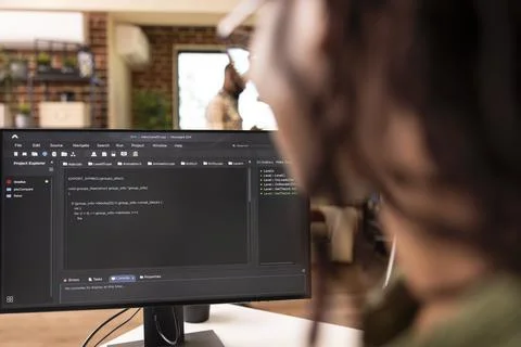 Closeup of black freelance developer using desktop monitor Stock Photos