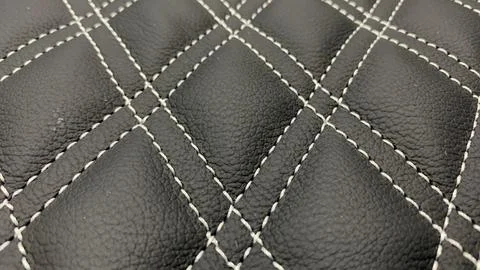 Closeup the black leather with stitching texture, Foto stock