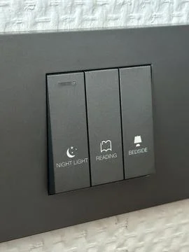 Closeup black power switches with function text Stock Photos