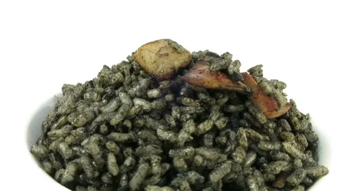 Closeup of black rice dish rotating Stock Footage 56141246