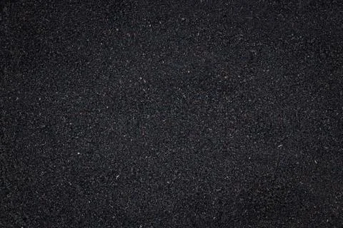Closeup black soil texture background Foto stock