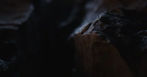 Closeup of Black Stone Surface Texture with Slow Probe Lens Push-In Stock-Footage 348705890