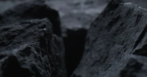 Closeup of Black Stone Surface Texture with Slow Probe Lens Push-In Stock-Footage 348706402