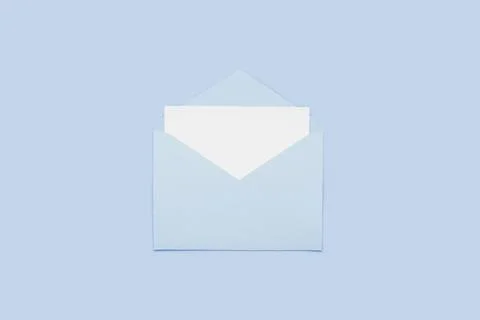 Closeup on blank empty white paper card in blue opened envelope isolated on blue Stock Photos