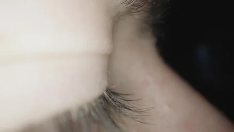 Closeup of blinking eye with the long lashes Stock Footage 344915583