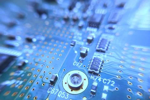 Closeup blue computer PCB board. Macro picture of green printed circuit board Stock Photos