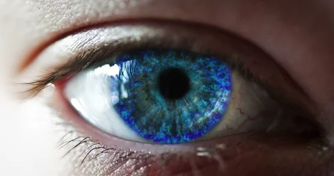 Closeup of a blue eye pupil, iris fire 3D looping animation Stock Footage 107393222