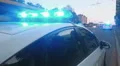 Closeup blue flashing police lights on top of patrol car, crime scene, emergency 4k or 4k+ Resolution