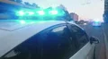 Closeup blue flashing police lights on top of patrol car, crime scene, emergency HD Footage