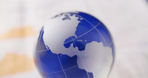 Closeup Of Blue Glass Globe On Table 4K Stock Footage 86084334