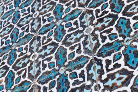 Closeup of a blue Islamic ceramic tile pattern, mosque wall Stock Photos