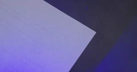 Closeup of blue laser burning through cardboard Stock Footage 105550976