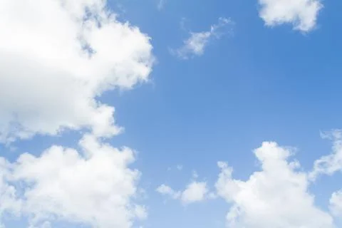 Closeup of blue sky with white clouds Stock Photos
