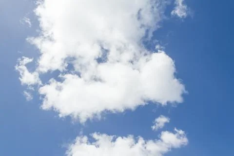 Closeup of blue sky with white clouds Stock Photos