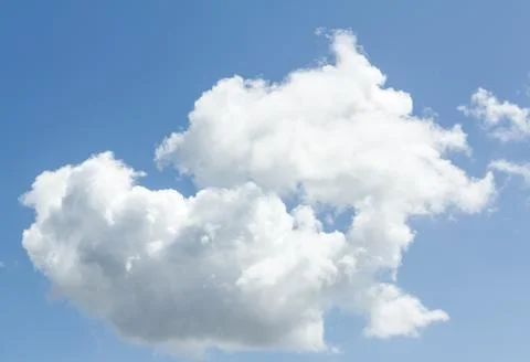 Closeup of blue sky with white clouds Stock Photos