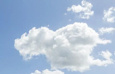 Closeup of blue sky with white clouds Stock Photos