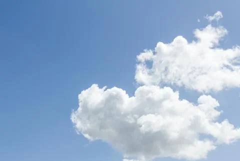 Closeup of blue sky with white clouds Stock Photos