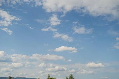 Closeup of blue sky with white clouds. Stock Photos