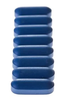 Closeup of Blue Tablets in a row Stock-Fotos