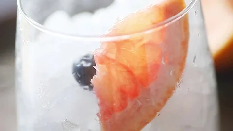 Closeup of blueberry grapefruit drink Stock Footage 77171828