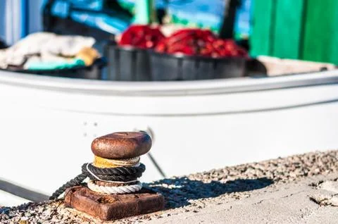 Closeup of bollard in the harbor Stock Photos