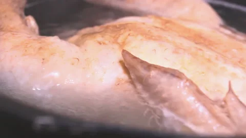 Closeup bone in pan with boiling water. Chicken broth healthy immune soup 스톡 동영상 188374831
