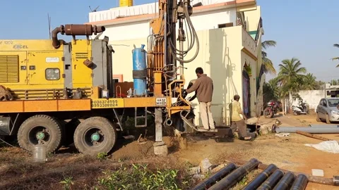 Closeup of Borewell Drilling Lorry or Vehicles with tools, pipe, machine and  Stock Footage 150148390