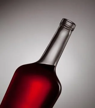 Closeup of a bottle back lit Stock Photos