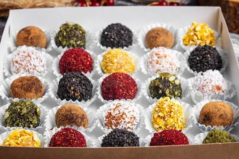 Closeup on box of assorted craft chocolate candies Stock Photos