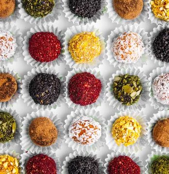 Closeup on box of assorted craft chocolate candies Stock Photos