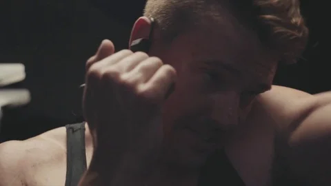 Closeup of boxer in cinematic lighting Stock Footage 76725302