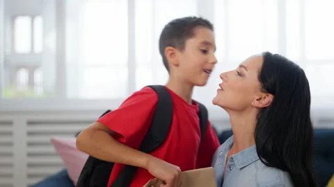 Closeup of boy leaving for school in the... | Stock Video | Pond5