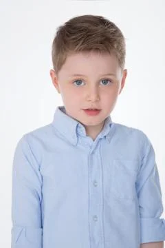 Closeup of boy on white background Stock Photos