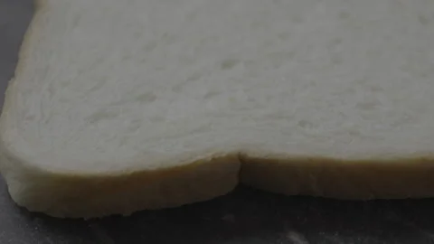 Closeup of a bread on backdrop Stock Footage 305426103