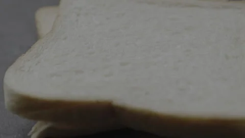 Closeup of a bread on backdrop Stock Footage 305426130