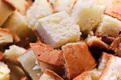 Closeup of bread cut into cubes for stuffing Stock Photos