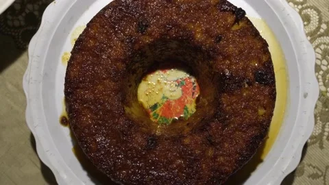 Closeup a bread pudding cake with raisin made at home Stock Footage 157815670