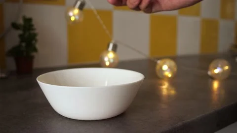 Closeup of breaking eggs for a nice meal in slow motion Video stock 157024952