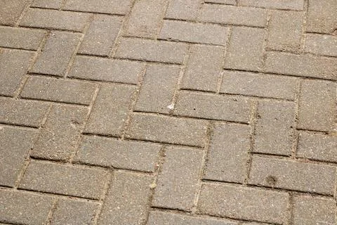 Closeup of brick pavement with a unique diagonal pattern Stock Photos