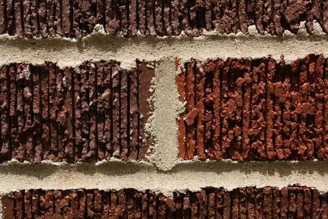 Closeup on bricks and mortar on wall Stock Photos