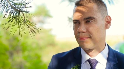 Closeup of bride and groom exchanging wedding rings over green nature background Stockbeeldmateriaal 82947968